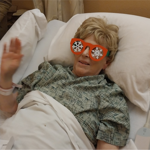 Ben sent Jan a Christmas card in the shape of glasses. She had to try it on.