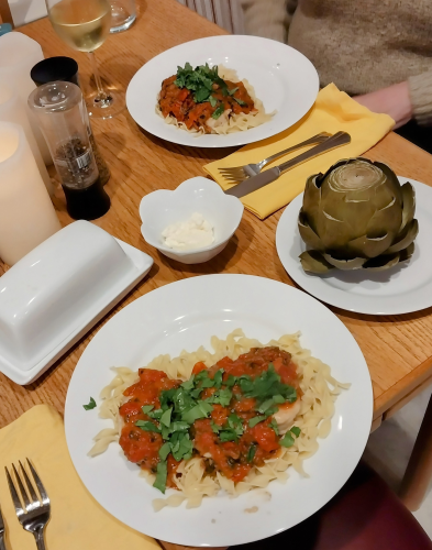 We tried a new recipe - Chicken With Burst Tomato Sauce.  It came out great.