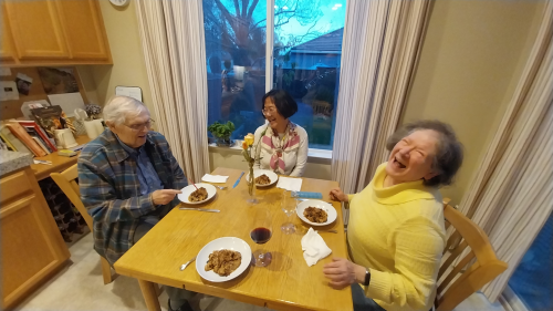 Dad watching his birthday candle slowly lean from the hot bread pudding.