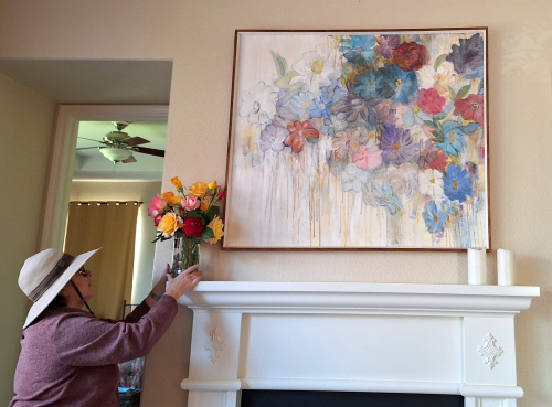 Robin putting the finishing touch to the spring picture swap.